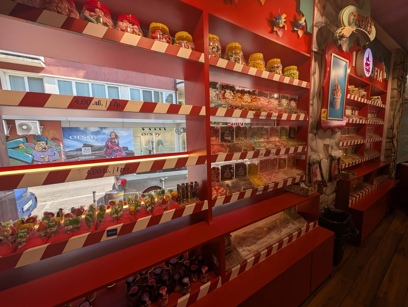Interior shelves with jars of sweets and lollipops at Hansel and Gretel candy shop in Sofia