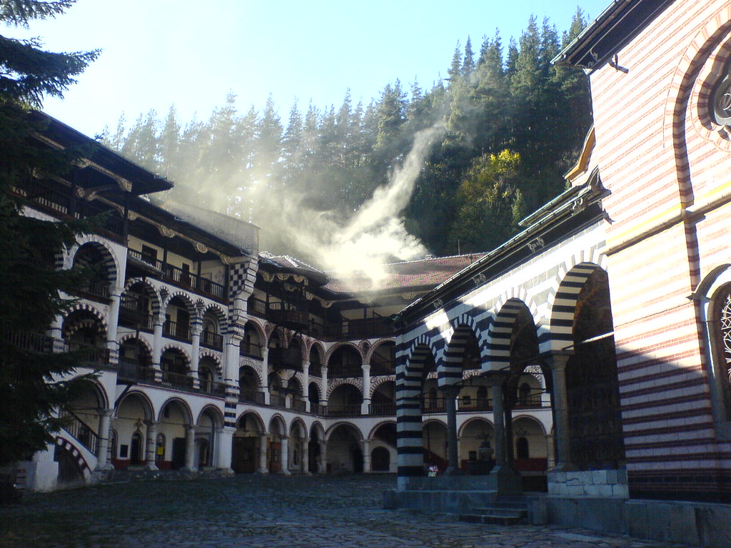 UNESCO Rila Monastery inner courtyard with black-and-white striped cloisters