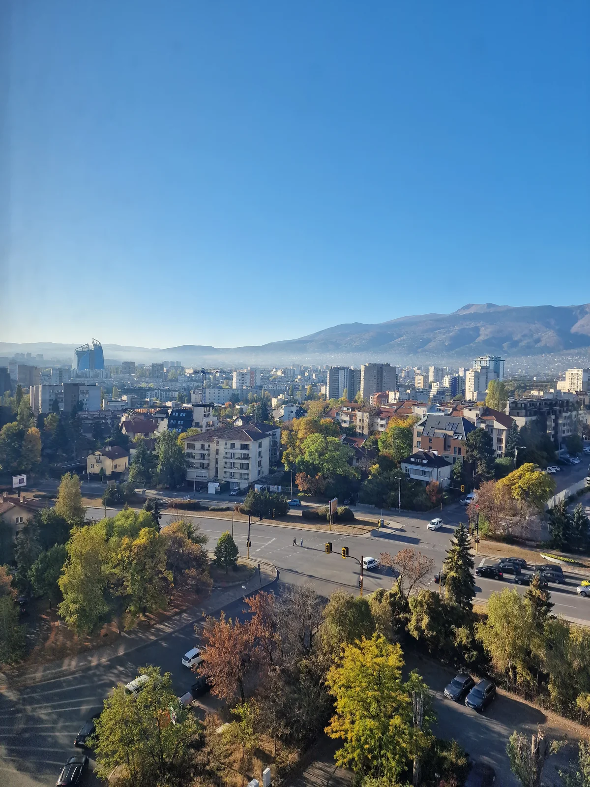 Elevated panoramic view over Sofia street intersection looking south toward Mount Vitosha